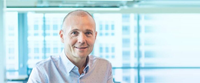 A man smiling at the camera.