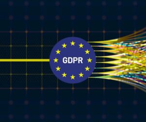 A graphic showing a blue circle with yellow stars and GDPR in the center. Data streams converge into the circle, symbolizing how organizations manage GDPR compliance and data regulation under the European General Data Protection Regulation.