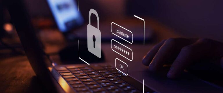 A person types on a laptop keyboard with a graphic of a padlock and a login form, symbolizing online security and data protection—highlighting the need to avoid security risks when considering security outsourcing solutions.