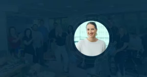 A group of people posing and smiling in an office, with a circular cutout highlighting a woman in a white top, smiling at the camera, centered in the foreground—perfect for discussing B Corp Certification on a podcast.